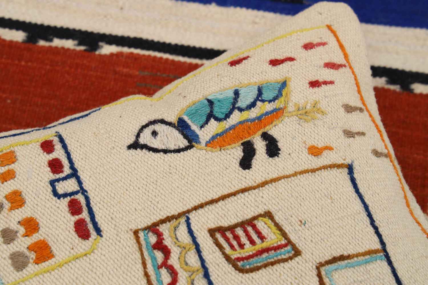 HAND EMBROIDERED THROWS/ CUSHIONS