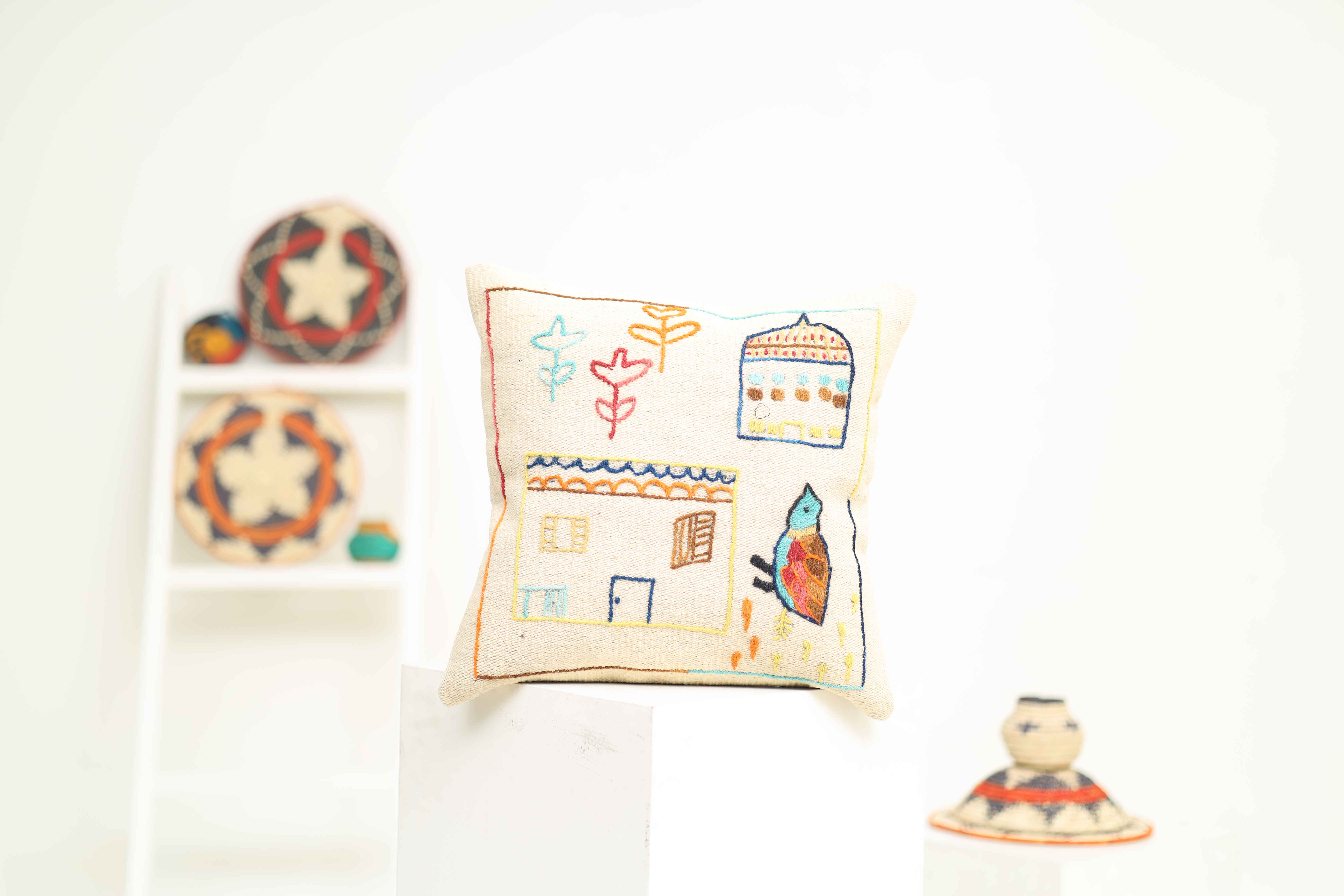 HAND EMBROIDERED THROWS/ CUSHIONS