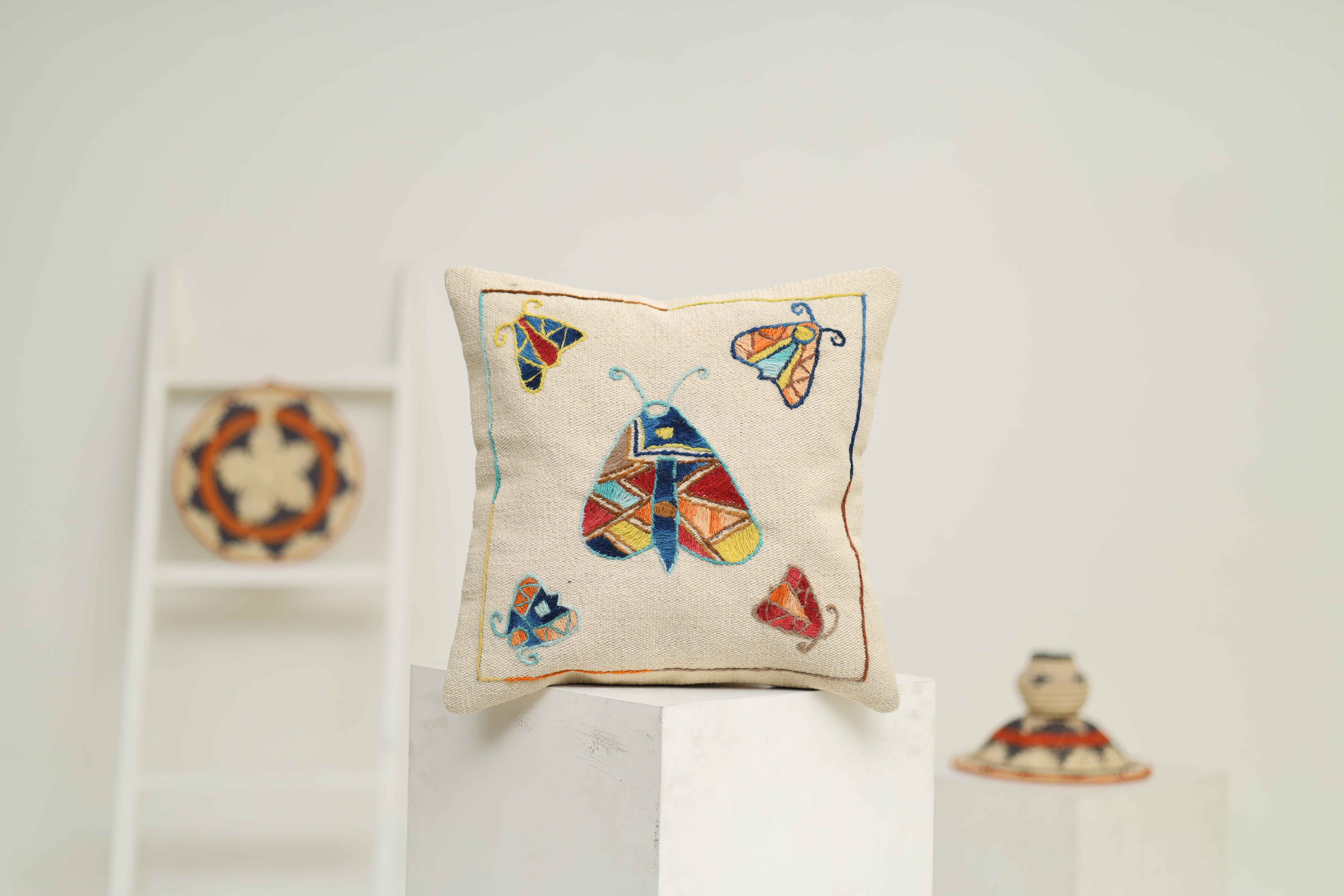 HAND EMBROIDERED THROWS/ CUSHIONS