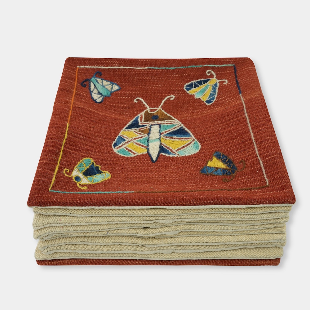 HAND EMBROIDERED THROWS / CUSHIONS
