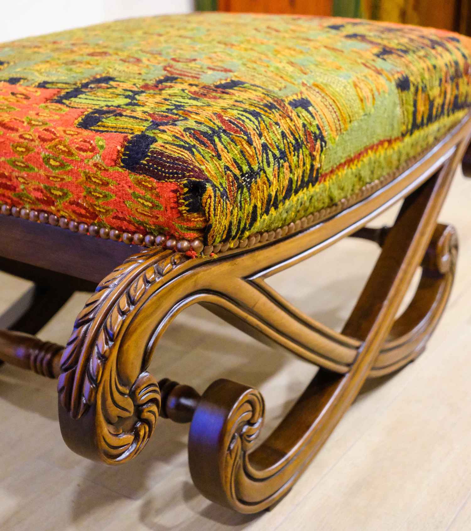 UPHOLSTERED HAND CARVED BLOCH OTTOMAN (NTAMC)