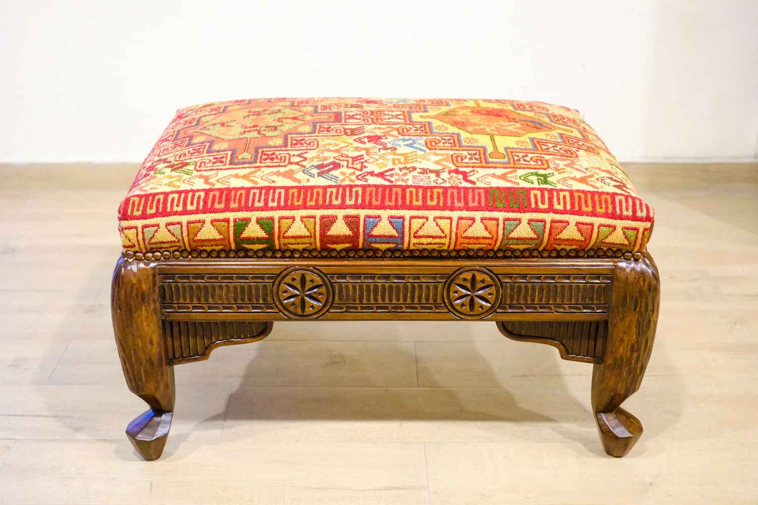 UPHOLSTERED HAND CARVED MEXICAN OTTOMAN (NTAMA)