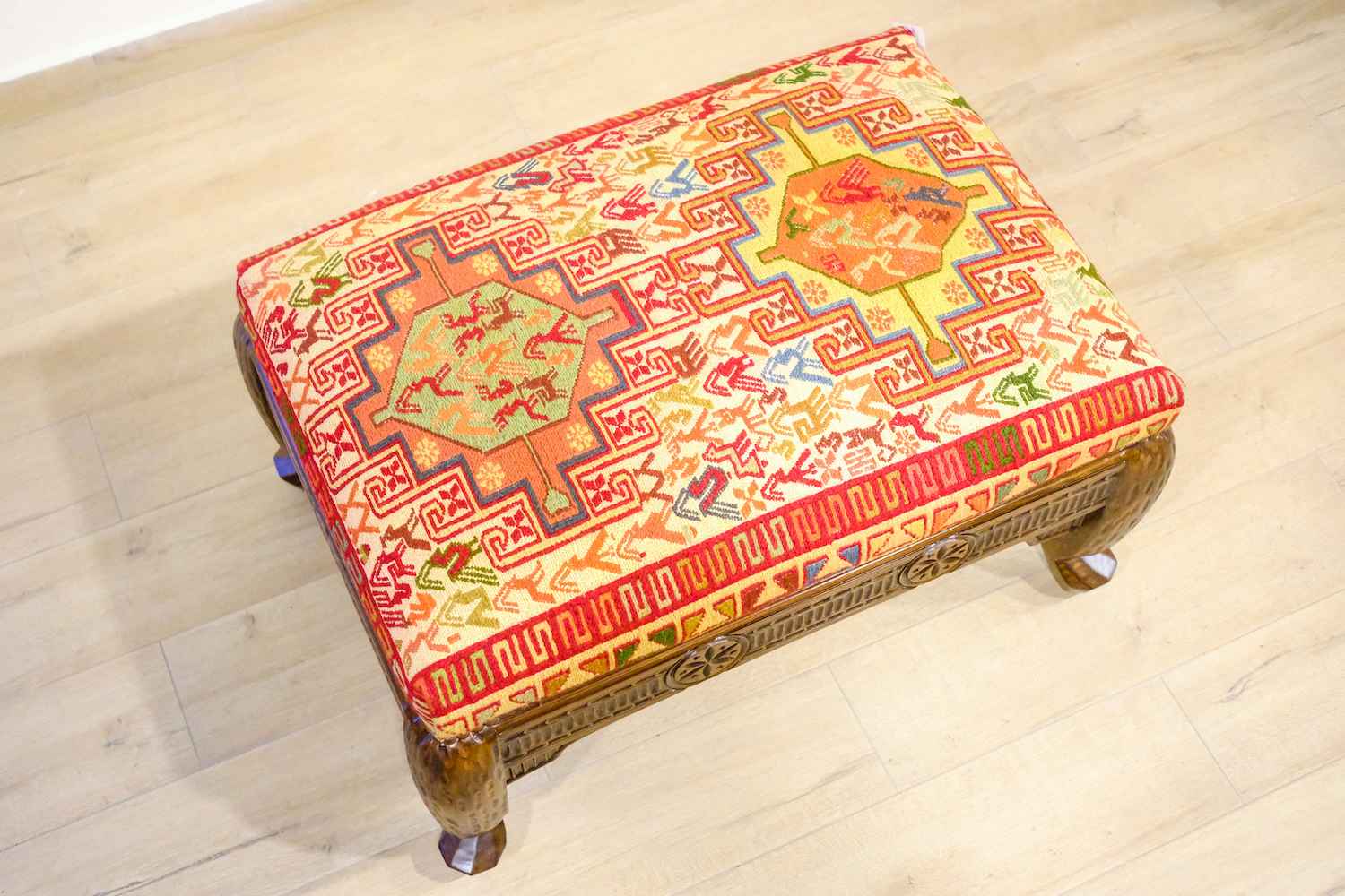 UPHOLSTERED HAND CARVED MEXICAN OTTOMAN (NTAMA)