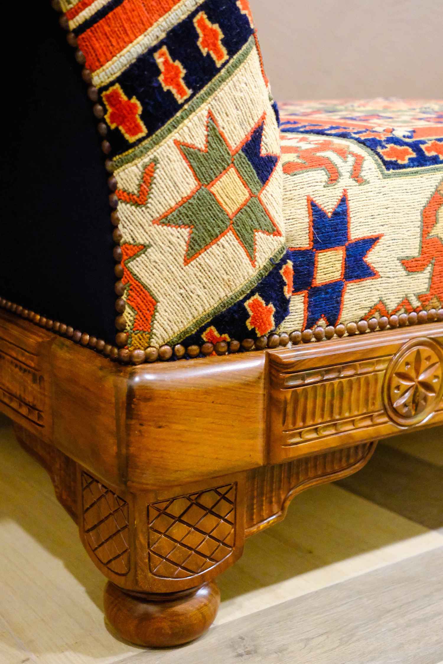 UPHOLSTERED HAND CARVED HUB SOFA (NTAMC)