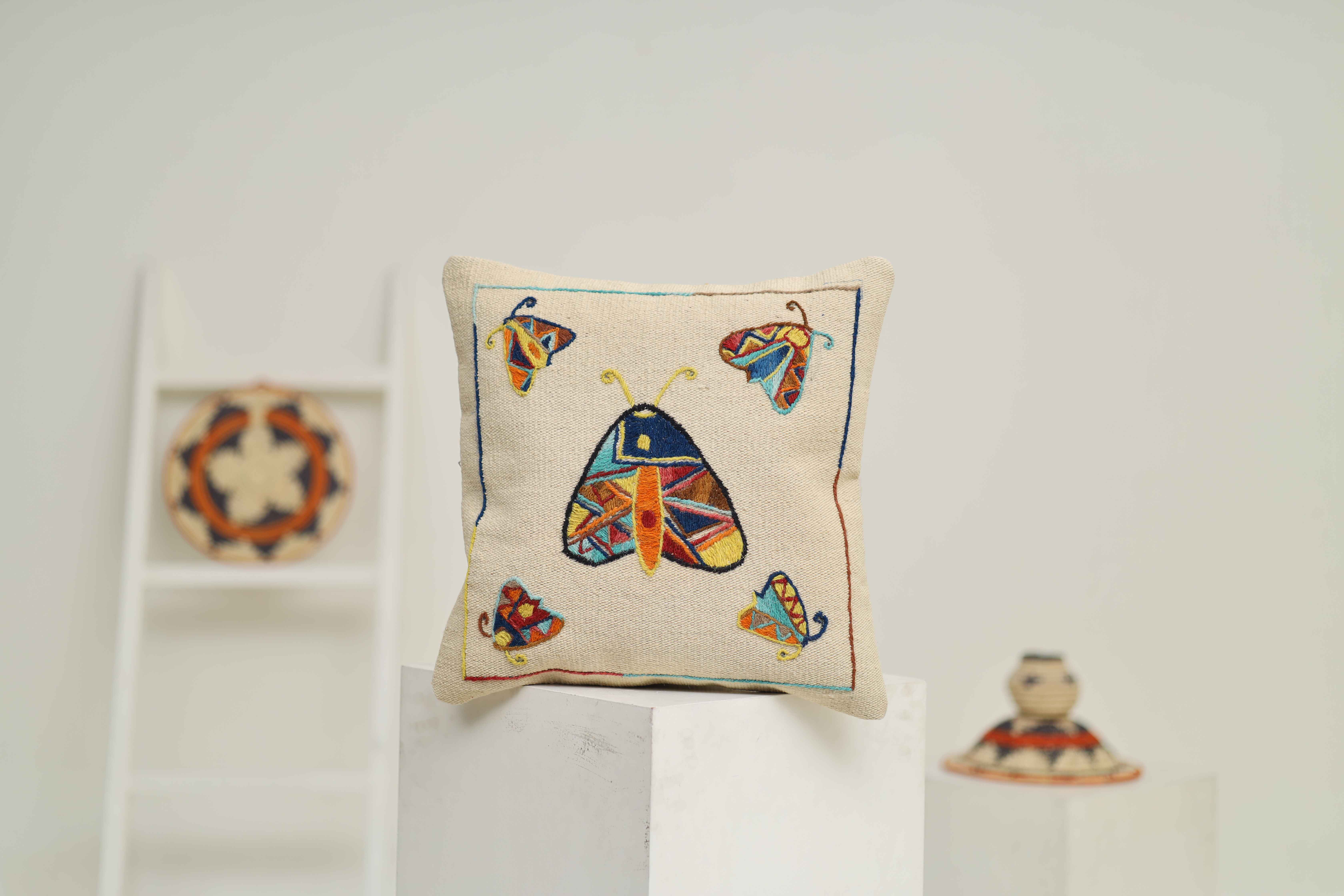 HAND EMBROIDERED THROWS/ CUSHIONS